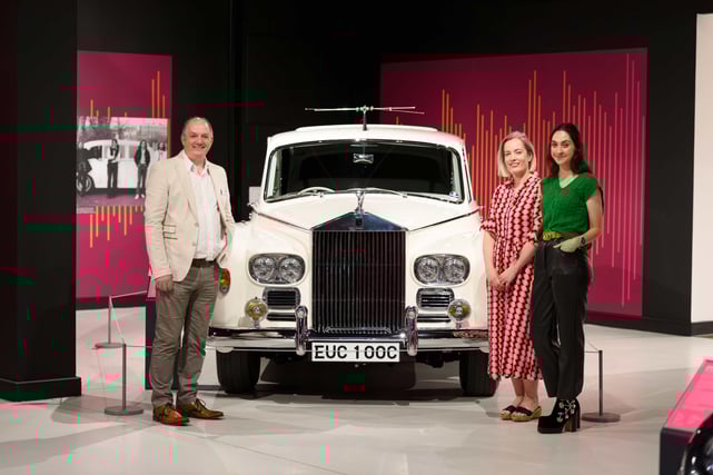 Stephen Laing, Amy Forster-Smith and Cat Boxall stood next to the white Rolls Royce that belonged to John Lennon
