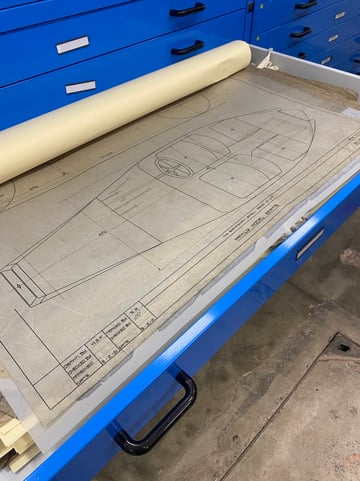 A technical drawing from the BSA collection. It is shown in a blue cabinet, with the drawer partially open.