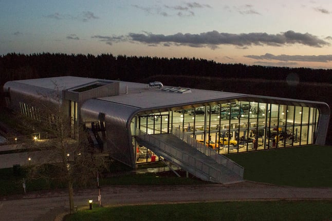 The British Motor Museum Collections Centre. A large metallic building with large windows on one side.