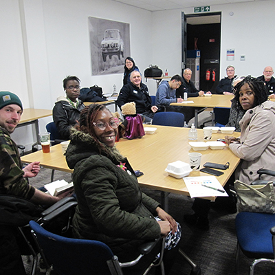 A group shot from one of the Museum sessions showing artists, elders and volunteers.