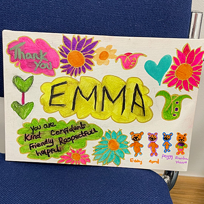 A thank you canvas painted message for Emma - our Learning and Engagement Coordinator