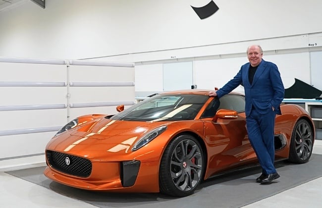 Ian Callum standing with Jaguar-C-X75